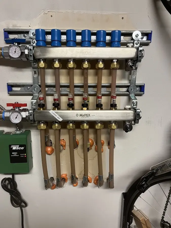 Plumber performing Gas Line Installation at a residential property in Madisonville